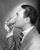 Side profile of a mature man drinking Poster Print - Item # VARSAL25512637