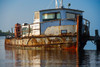 Rusty boat moored in a lake at sunrise, Placencia, Stann Creek, Belize Poster Print - Item # VARPPI166950