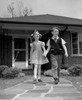 Boy and girl walking and holding hands Poster Print - Item # VARSAL25516252A