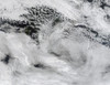 January 2, 2007 - Ship-wave-shaped wave clouds induced by Macquarie Island, Auckland Islands, and Campbell Island, South Pacific Ocean Poster Print - Item # VARPSTSTK201485S