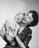 Young woman holding daughter and smiling Poster Print - Item # VARSAL2556010A