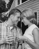 Close-up of a young couple toasting with glasses of soda Poster Print - Item # VARSAL25541404