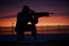 Silhouette of a U.S Marine on a bunker at sunset in Northern Afghanistan Poster Print - Item # VARPSTTMO100543M