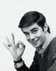 Portrait of a young man smiling and making an ok gesture Poster Print - Item # VARSAL25512487