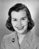 Studio portrait of young businesswoman with broach and gleaming smile Poster Print - Item # VARSAL25510730B