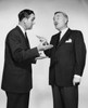 Two businessmen talking to each other Poster Print - Item # VARSAL25541659