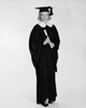 Young woman wearing a graduation gown and holding a diploma Poster Print - Item # VARSAL2557538B