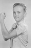 Portrait of boy showing off muscles Poster Print - Item # VARSAL255418859