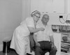 Nurse examining patient Poster Print - Item # VARSAL255423306