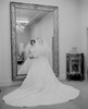Bride wearing wedding dress  looking in mirror Poster Print - Item # VARSAL255424900