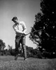Mid adult man swinging golf club Poster Print - Item # VARSAL25521882