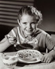 Portrait of a girl having breakfast Poster Print - Item # VARSAL2553304