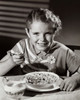 Portrait of a girl having breakfast Poster Print - Item # VARSAL2553304