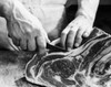 Mid section view of a man's hands cutting raw meat Poster Print - Item # VARSAL25536981