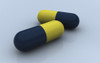 Blue and yellow medication capsules on colored background Poster Print - Item # VARPSTSTK701183H