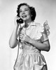 Young woman talking on the telephone Poster Print - Item # VARSAL2553350