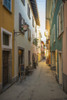 Colorful architecture along a narrow alleyway; Ascona, Ticino, Switzerland PosterPrint - Item # VARDPI2430690