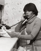 Young woman talking on the telephone Poster Print - Item # VARSAL2558739