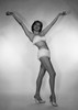 Young woman wearing bikini with raised hands  studio shot Poster Print - Item # VARSAL255417354