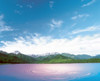 Pink light cast down on two rings in lavender water with deep blue sky and clouds over green mountains in distance Poster Print by Panoramic Images (24 x 20) - Item # PPI117981