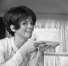 Beautiful woman holding cake Poster Print - Item # VARSAL255420945