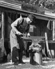 Amish blacksmith working on an anvil  Worcester  Pennsylvania  USA Poster Print - Item # VARSAL25531410