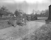 Vintage photograph of boy pulling gocart with girl on country road Poster Print - Item # VARSAL25516326