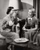 Two young women talking to each other Poster Print - Item # VARSAL25525583