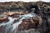 Hawaii, Maui, Makena, Ocean water moving through a lava tube. PosterPrint - Item # VARDPI2116652