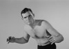 Portrait of young man in fighting stance Poster Print - Item # VARSAL255419008