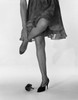 Woman standing on one leg and massaging ankle  low section Poster Print - Item # VARSAL255417419