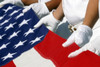 Pearl Harbor, Hawaii, August 30, 2003 - A Naval Station Pearl Harbor Ceremonial Guard folds the National Ensign during a burial ceremony held aboard the USS Utah Memorial Poster Print - Item # VARPSTSTK101222M