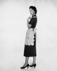 Studio shot of young woman standing with finger on chin Poster Print - Item # VARSAL25542054