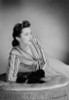 Portrait of elegant young woman leaning on Poster Print - Item # VARSAL255418904