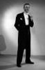 Elegant young man holding cigarette Poster Print - Item # VARSAL25518463