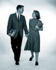 Studio shot of female and male students holding hands Poster Print - Item # VARSAL255417182