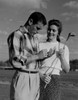 Young couple  woman holding golf club Poster Print - Item # VARSAL255422138