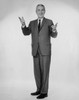 Studio portrait of businessman gesturing Poster Print - Item # VARSAL25548137