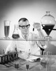 Scientist examining chemical in a test tube Poster Print - Item # VARSAL2554464