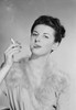 Attractive young woman smoking cigarette Poster Print - Item # VARSAL255418906