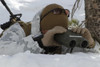 January 24, 2011 - A scout sniper takes an observer, watching to see any position changes in his target during the Mountain Scout Sniper Course at Marine Corps Mountain Warfare Training Center, California Poster Print - Item # VARPSTSTK104449M