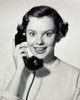 Portrait of teenage girl talking on telephone Poster Print - Item # VARSAL2552814