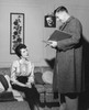Businessman and a businesswoman talking to each other Poster Print - Item # VARSAL25527976