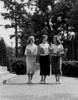 Three female students walking and laughing Poster Print - Item # VARSAL255419331