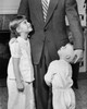 Mid section view of a father standing with his son and daughter Poster Print - Item # VARSAL25522150