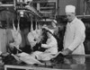 Three workers working in a turkey processing plant  Frozen Food Plant  Hillsboro  Oregon  USA Poster Print - Item # VARSAL25525624