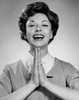 Studio portrait of young woman praying Poster Print - Item # VARSAL25511215B