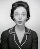 Studio portrait of young woman puckering Poster Print - Item # VARSAL25510548