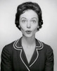 Studio portrait of young woman puckering Poster Print - Item # VARSAL25510548