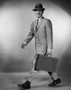 Portrait of a businessman walking carrying a briefcase Poster Print - Item # VARSAL25548134